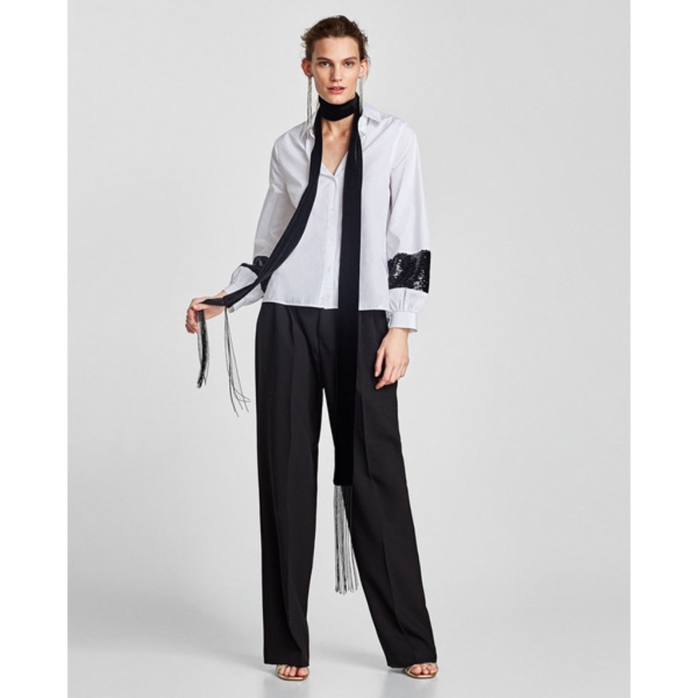 - Zara women’s shirt size XS